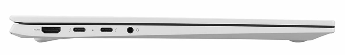 Widok z boku białego laptopa, cienkiego, z widocznymi portami z boku.