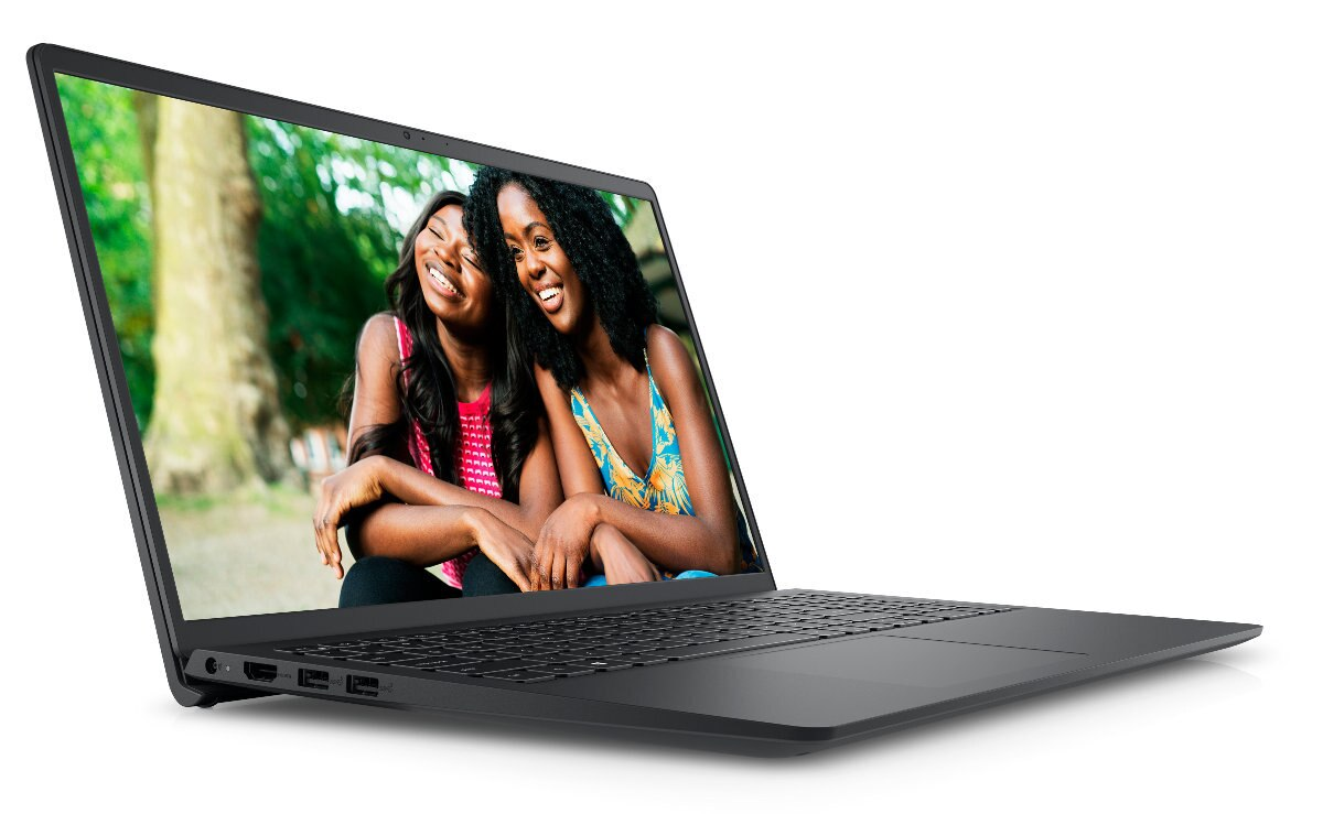 Czarny laptop wyświetlający dwie uśmiechnięte kobiety, oparte o drzewo, w parku.