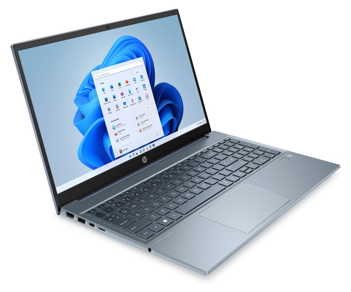 Laptop z interfejsem Windows 11 wyświetlanym na ekranie. Ma kolor niebieski i szary.