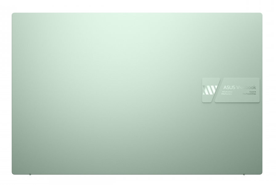 Widok z góry zielonej pokrywy laptopa z logo i tekstem.