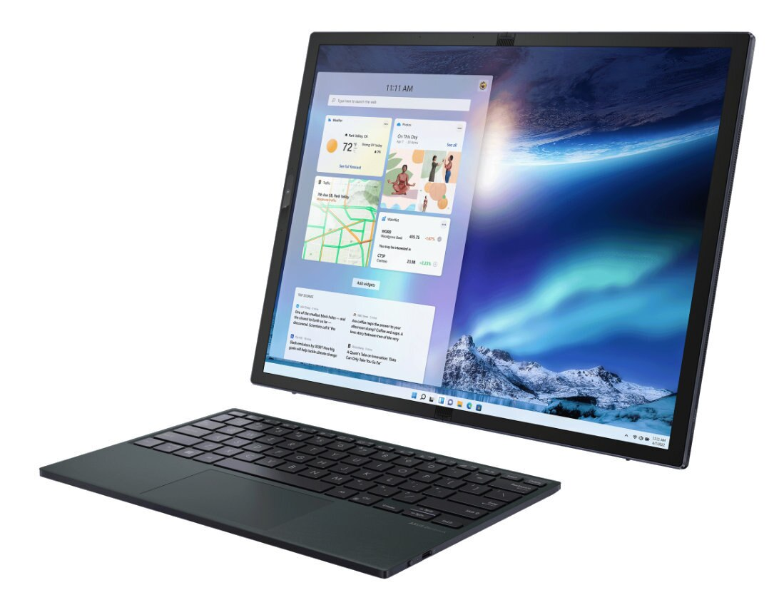 Laptop z podłączoną klawiaturą i wyświetlaczem pokazującym interfejs użytkownika z widżetami.