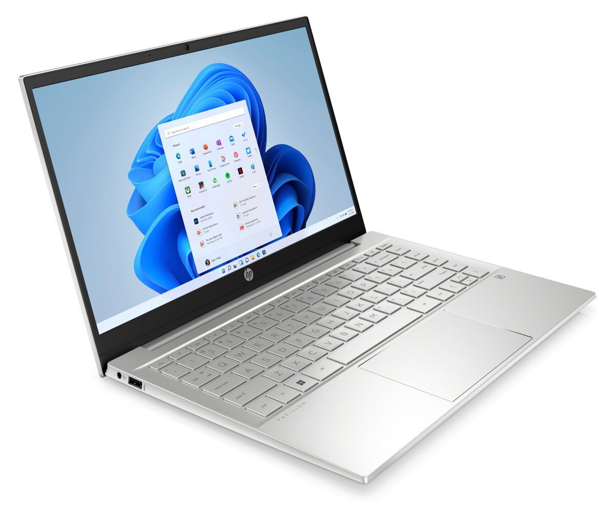 Otwarty srebrny laptop, Windows 11. Biały ekran, niebieskie tło.