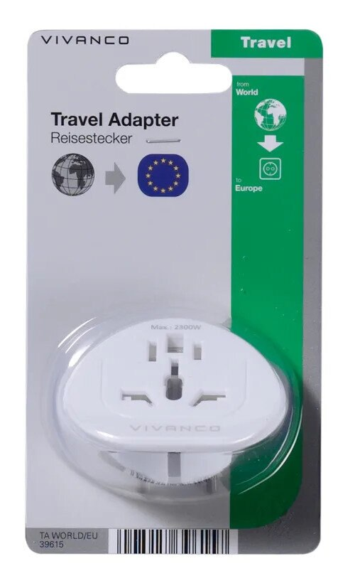 Biała przejściówka podróżna do Europy ze świata, zapakowana w szarą i zieloną kartę z tekstem.