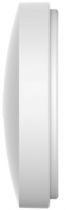 Widok z boku białego, okrągłego urządzenia. Ma zaokrąglony przód i płaski, okrągły tył.