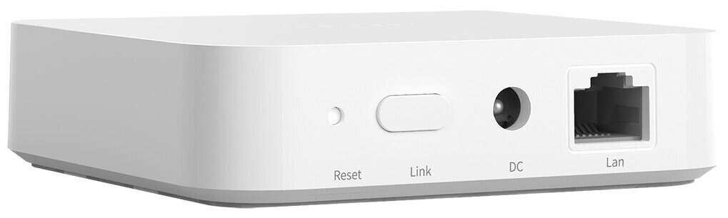 Białe urządzenie sieciowe z portami Reset, Link, DC i LAN. Białe tło.