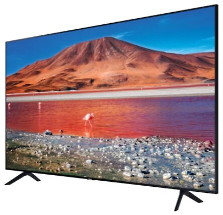 Duży telewizor wyświetlający malowniczy krajobraz. Telewizor jest czarny.