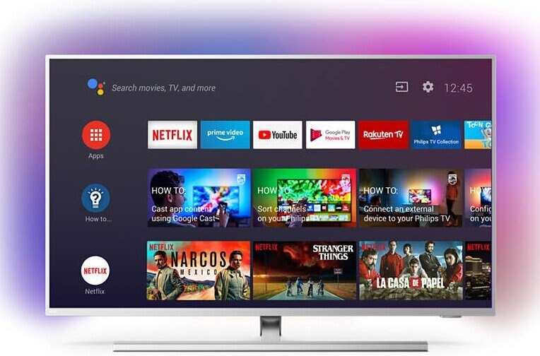 Ekran telewizora wyświetlający interfejs smart TV z ikonami aplikacji, w tym Netflix i YouTube.
