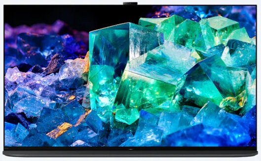Telewizor wyświetlający kolorowe kryształy, z czarną ramką.