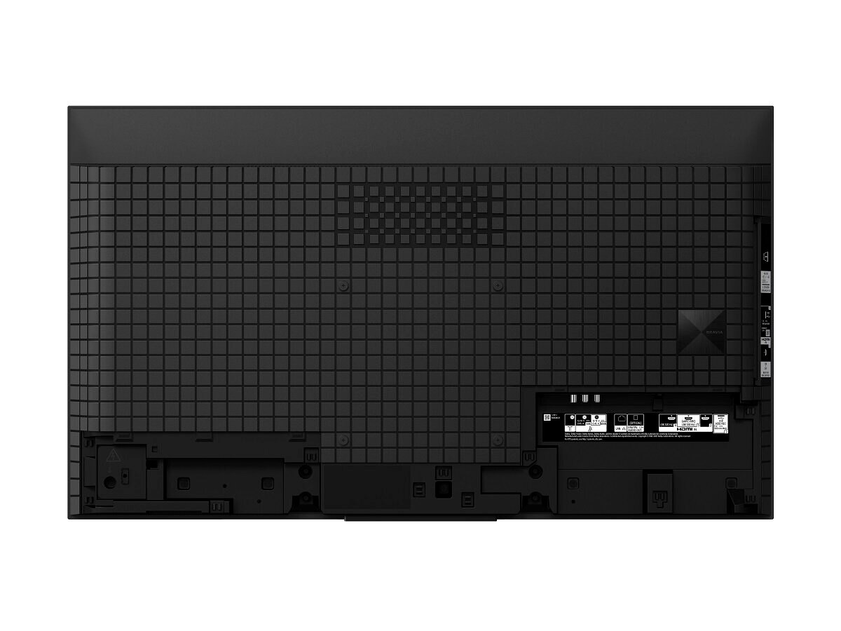 Tył czarnego telewizora z otworami wentylacyjnymi i portami połączeniowymi.