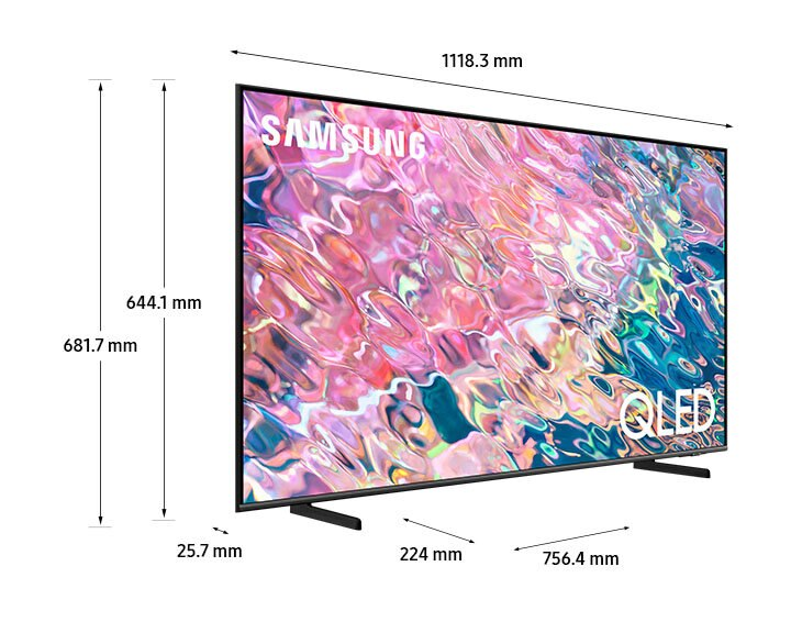 Telewizor na stojaku, wymiary opisane, pokazujący różowe tło.