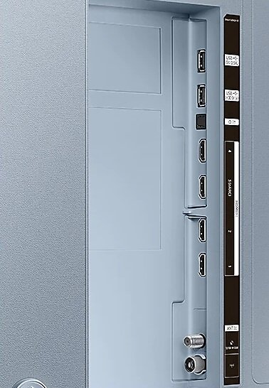 Zbliżenie portów TV. Zawiera porty HDMI, USB i antenowe.