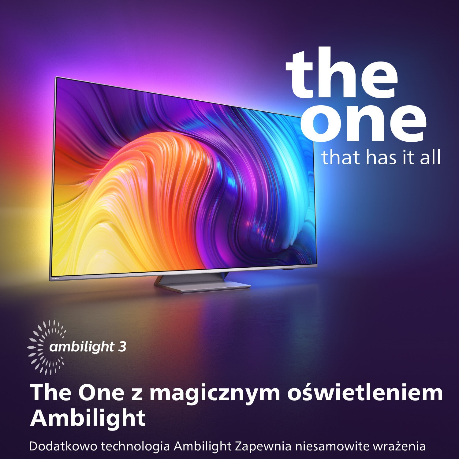 Telewizor z kolorowym światłem wokół. Tekst The One that has it all. Logo Ambilight 3. Białe tło.