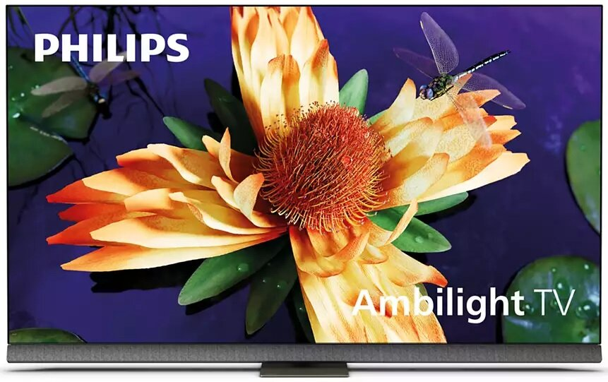 Telewizor Philips z kwiatowym wzorem na ekranie. Dwa ważki unoszą się nad ekranem.