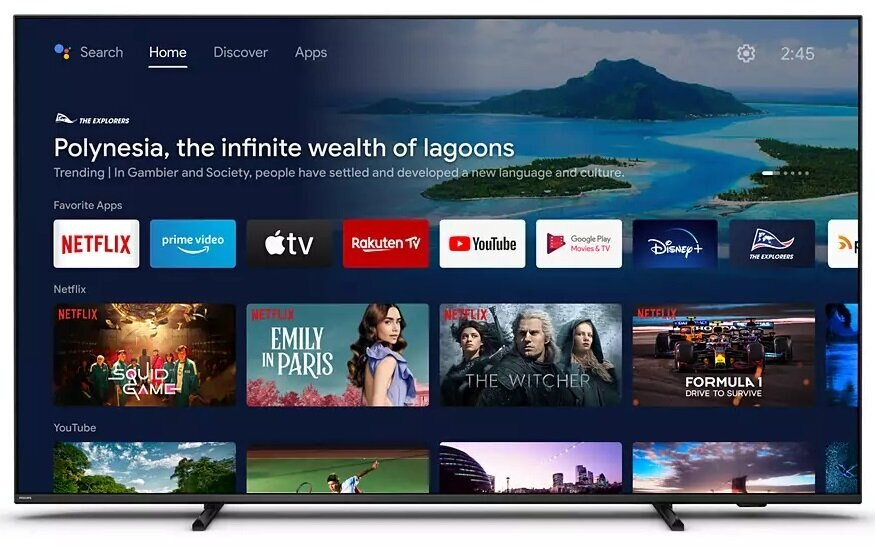 Ekran telewizora z ekranem głównym z aplikacjami takimi jak Netflix, Prime Video i YouTube. Góry w tle.