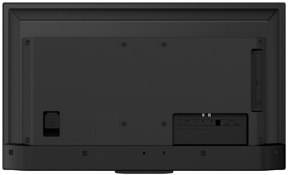 Tył czarnego telewizora z widocznymi portami i połączeniami, czysty i uporządkowany.