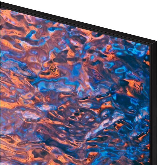 Zbliżenie ekranu telewizora z abstrakcyjnymi wzorami w kolorze niebieskim i pomarańczowym, na czarnej ramce.