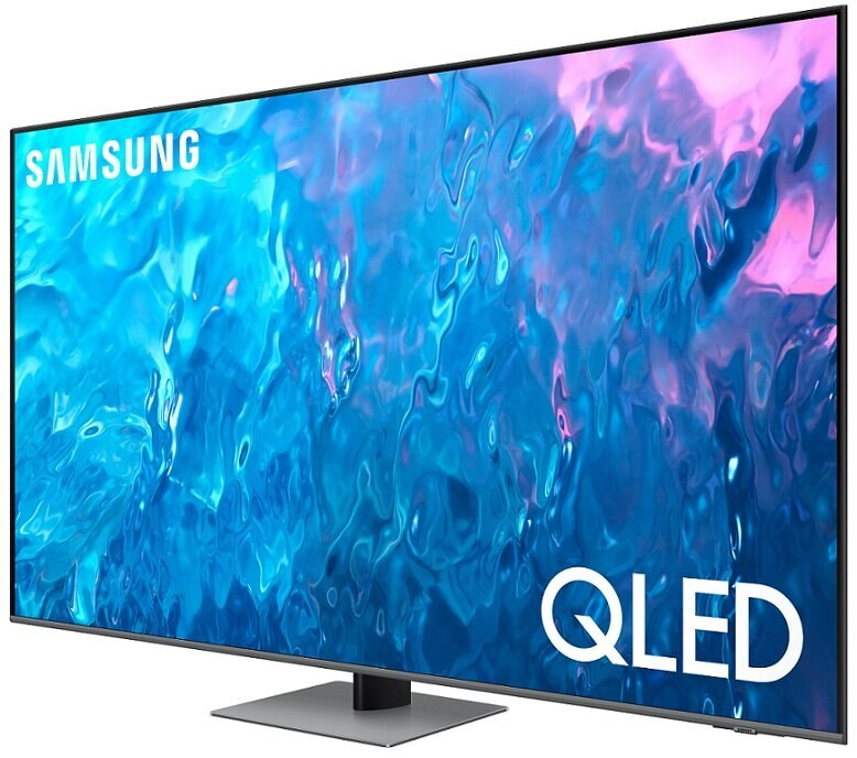 Telewizor Samsung QLED. Ekran wyświetla niebieską scenę wodną. Ma czarną ramkę.