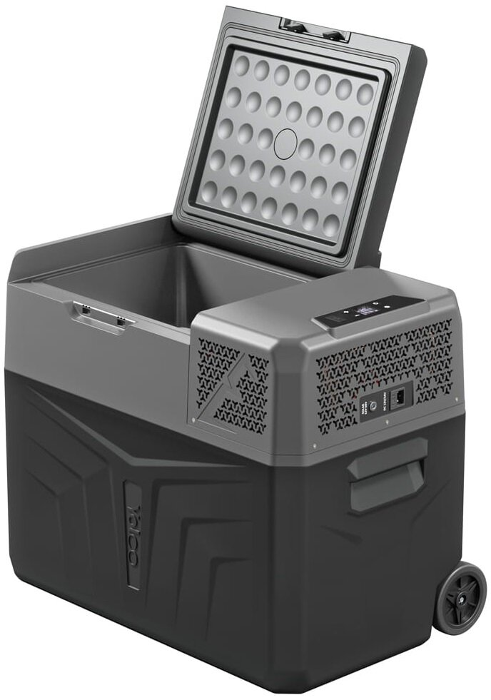 Szara chłodziarka z otwartą pokrywą. Na górze znajdują się okrągłe otwory wentylacyjne. Chłodziarka ma panel sterowania i uchwyt. Widoczne jest koło.