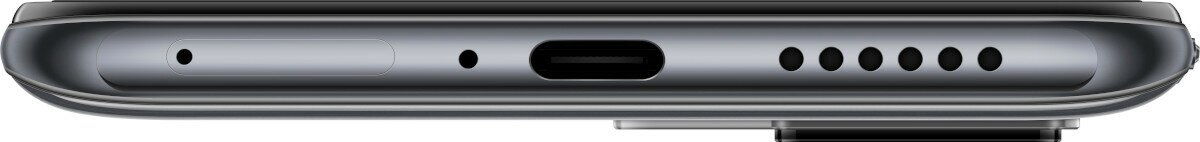 Ciemna krawędź telefonu z portami i otworami. Zbliżenie na dolną krawędź.