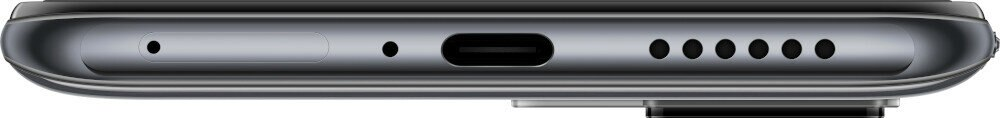 Ciemna krawędź telefonu z portami i otworami. Zbliżenie na dolną krawędź.