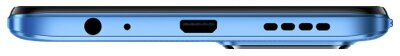 Zbliżenie dolnej krawędzi niebieskiego smartfona z portami i gniazdem słuchawkowym.