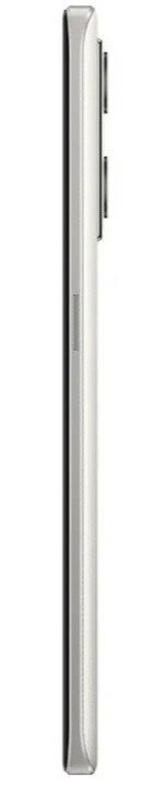 Widok z boku srebrnego telefonu. Przycisk głośności jest widoczny.