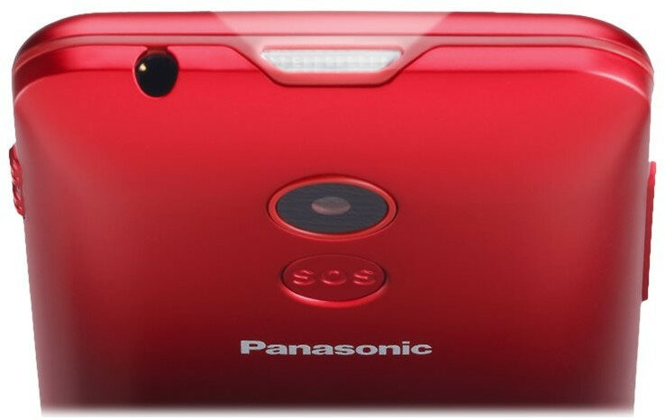 Czerwony telefon z klapką Panasonic, pokazujący tył, z aparatem i przyciskiem SOS.