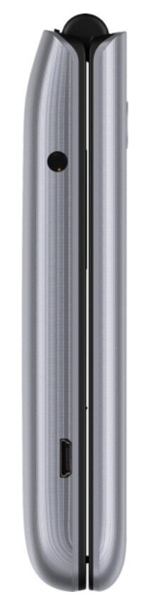 Mężczyzna używa golarki elektrycznej ze szczotką. Goli twarz.