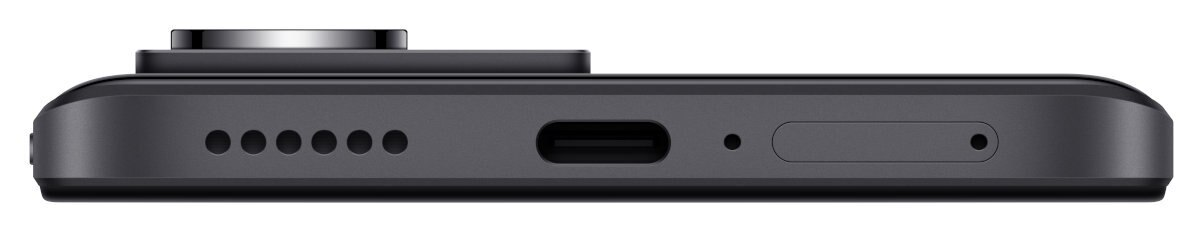 Dolna krawędź ciemnoszarego smartfona z otworami głośnikowymi, portem USB-C i innymi funkcjami.