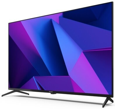 Duży, elegancki, czarny telewizor z ekranem wyświetlającym fioletowo-niebieski abstrakcyjny wzór geometryczny.