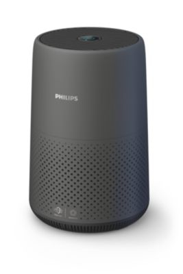Un purificateur d'air Philips gris foncé, forme cylindrique avec une section inférieure perforée.