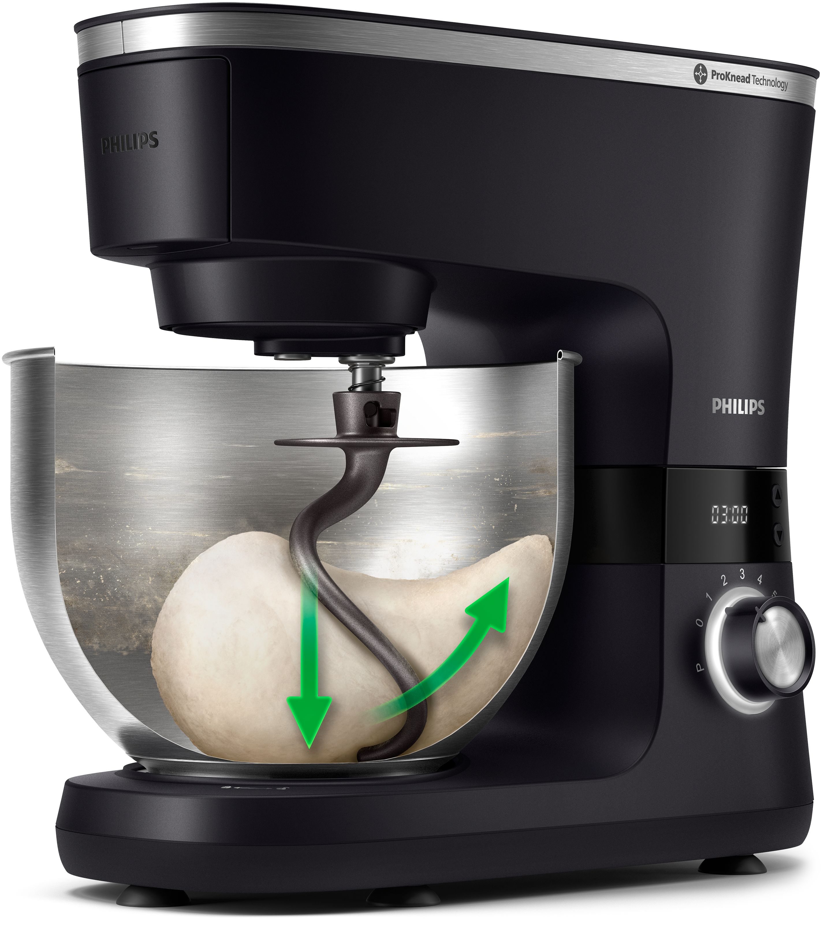 Black Philips stand mixer. Dough and the dough hook inside silver bowl. Green arrows.