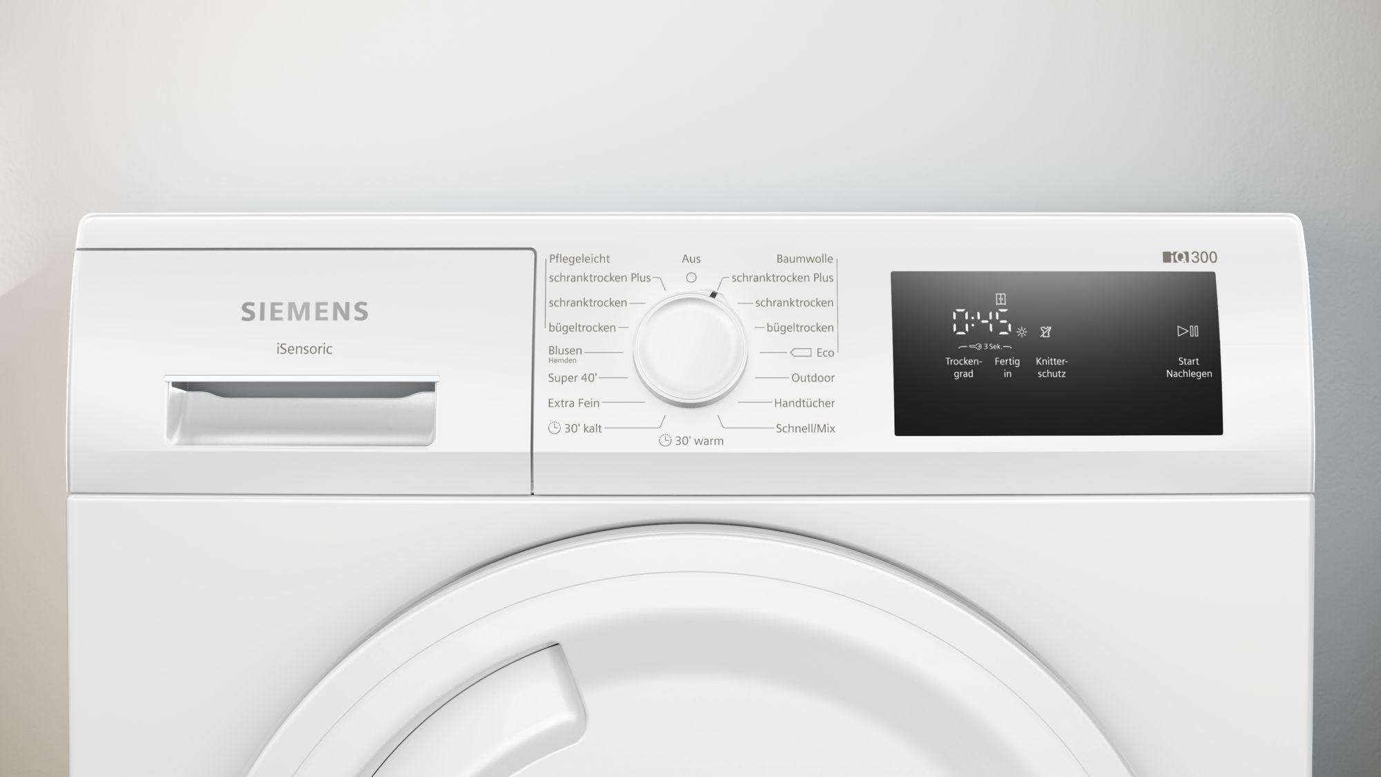 Ein weißes Siemens Waschmaschinen-Bedienfeld mit Digitalanzeige und verschiedenen Programmeinstellungen.