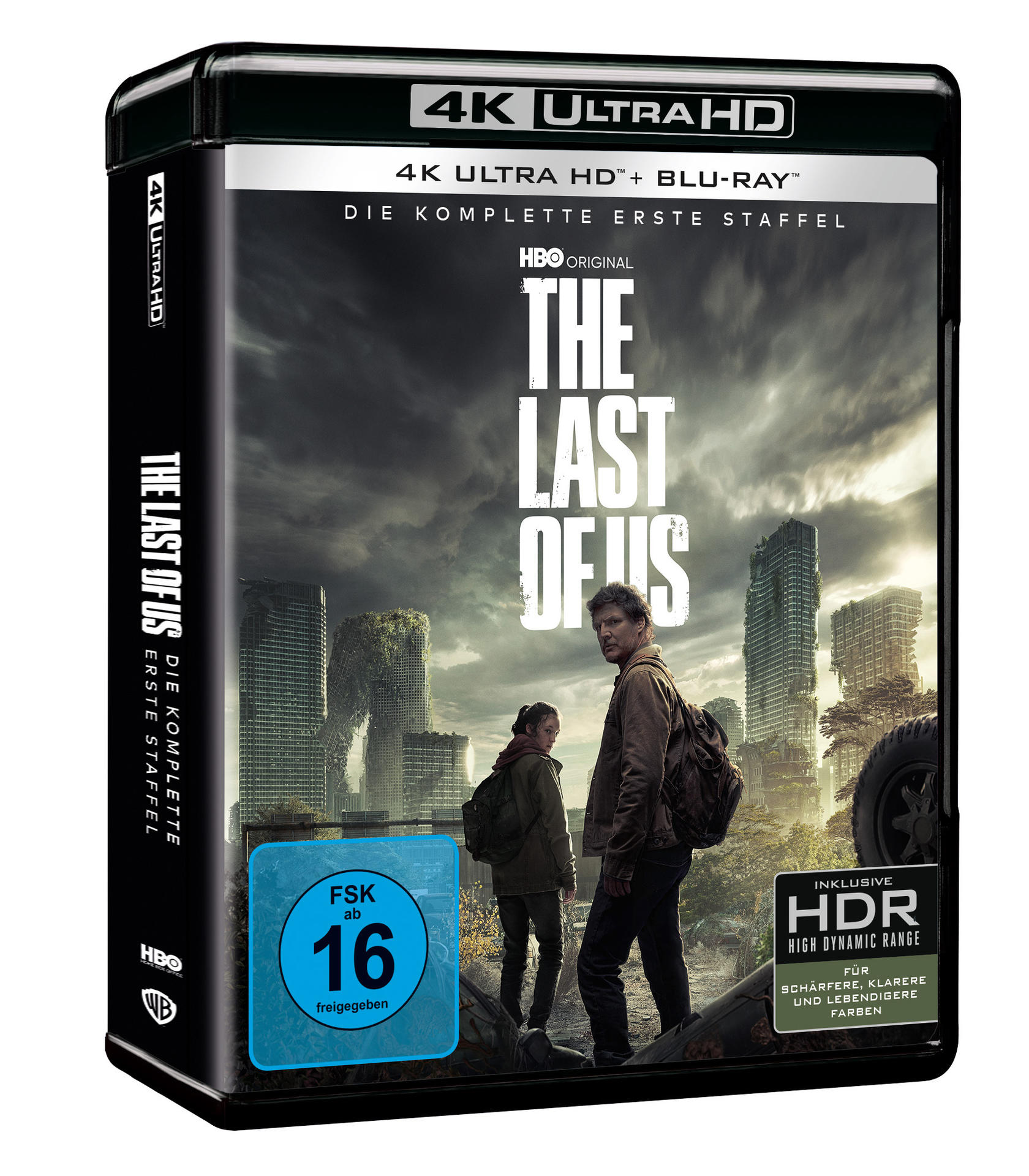 The Last of Us Blu-ray-Box, zeigt Mann und Frau in zerstörter Stadt.