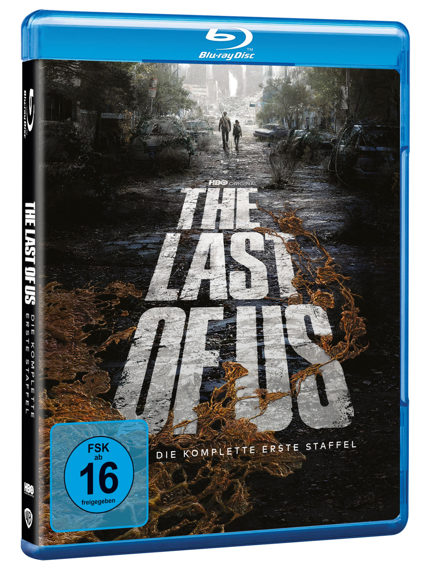 'The Last of Us' Blu-ray-Hülle. Dunkle, postapokalyptische Szene. Zwei Figuren gehen in zerstörter Stadt.