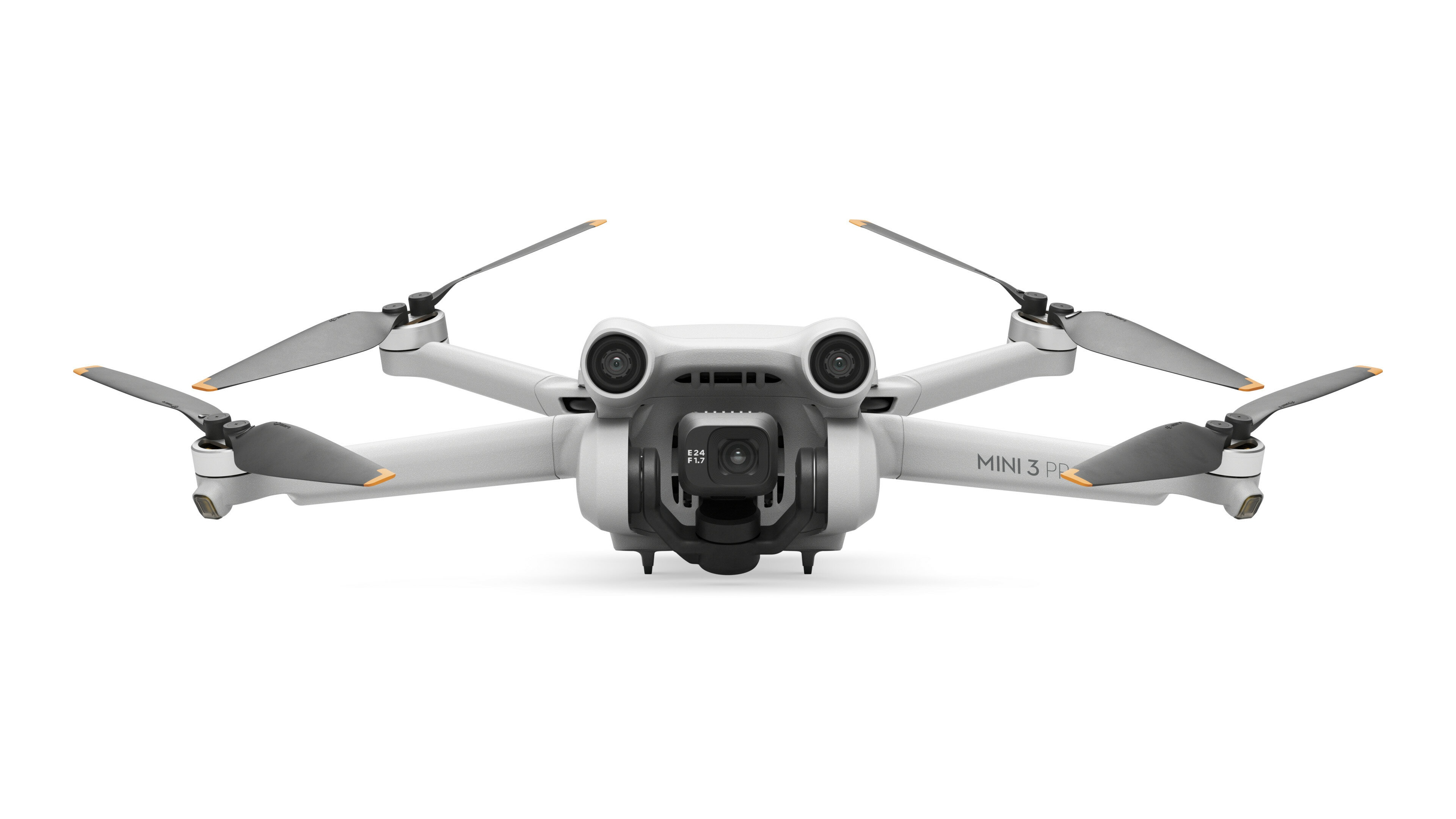 Biały dron z czterema śmigłami, dwoma kamerami i napisem 'MINI 3 PRO' na obudowie.