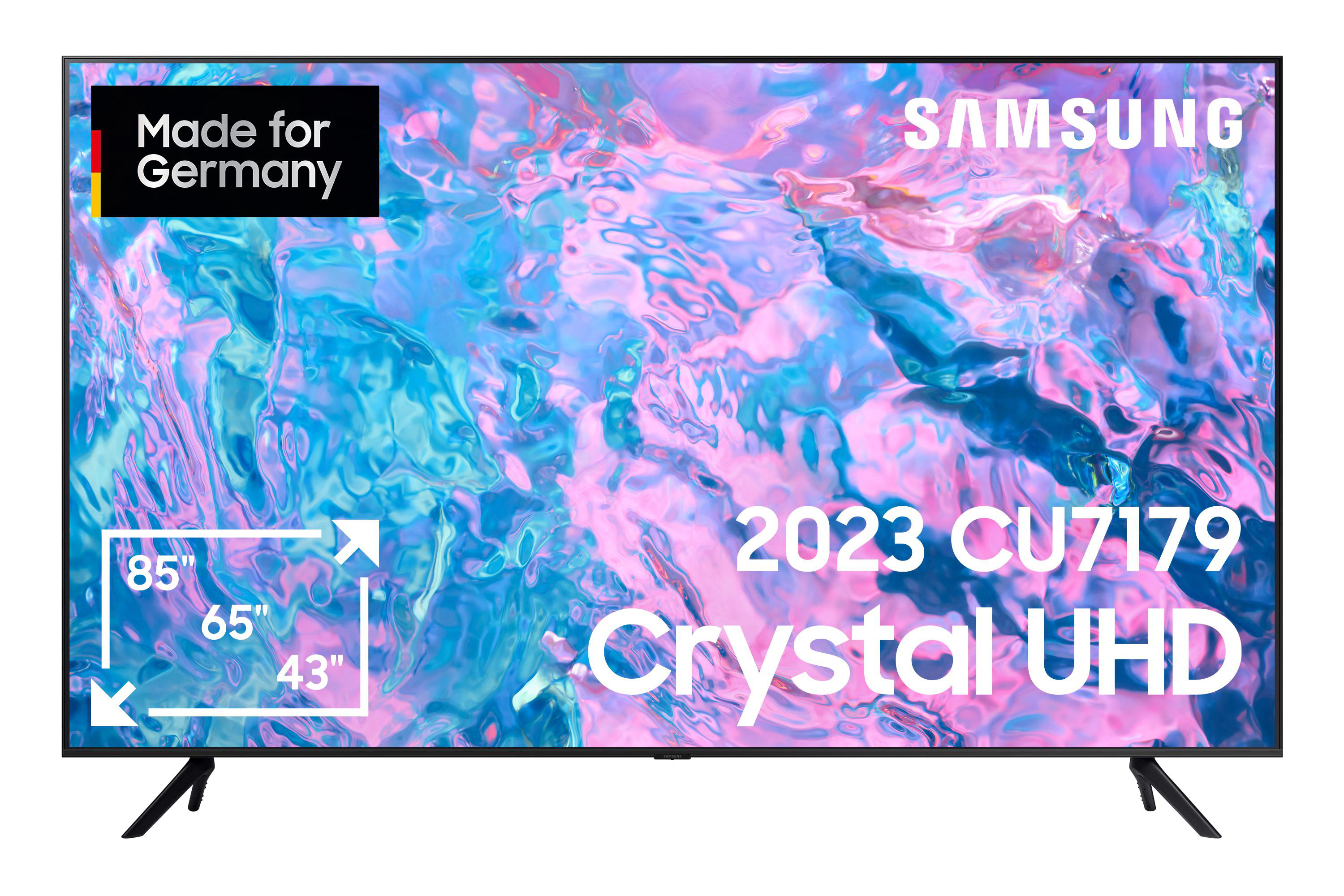 Großer Flachbildfernseher mit schwarzem Rahmen. Zeigt den Text '2023 Crystal UHD'.