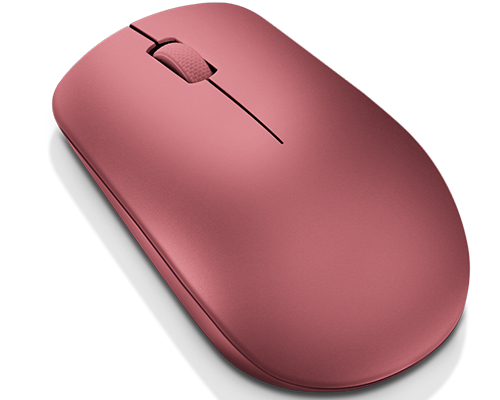 Un ratón de ordenador rosa con una rueda de desplazamiento, sobre un fondo blanco.