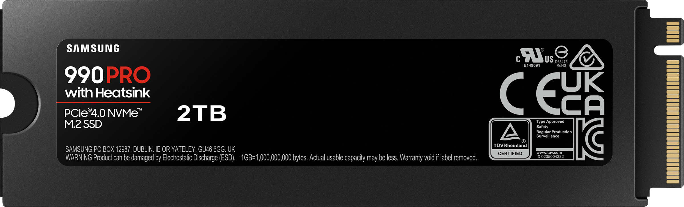SSD noir avec dissipateur thermique, étiquette indiquant "990 PRO" et "2TB" sur fond noir.