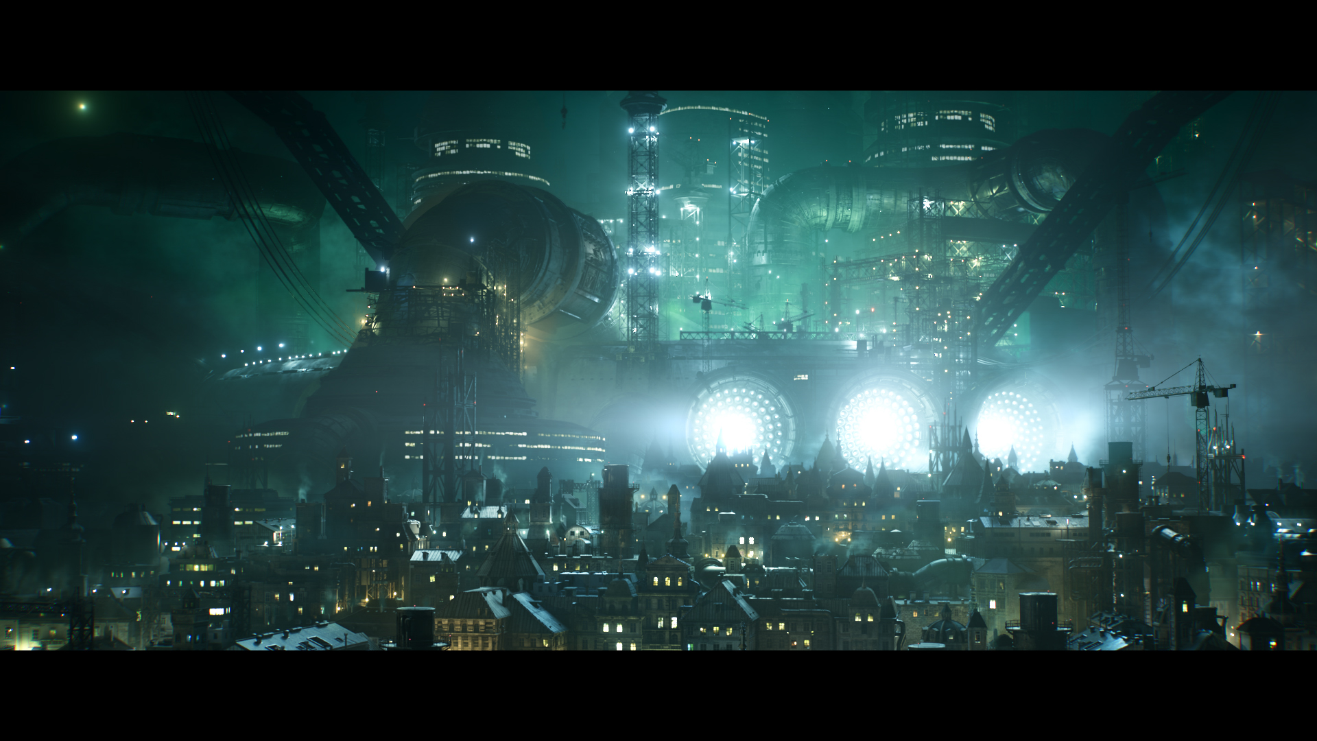 Una città futuristica di notte. Grandi strutture ed edifici alti, con luci. Un bagliore verde nel cielo.
