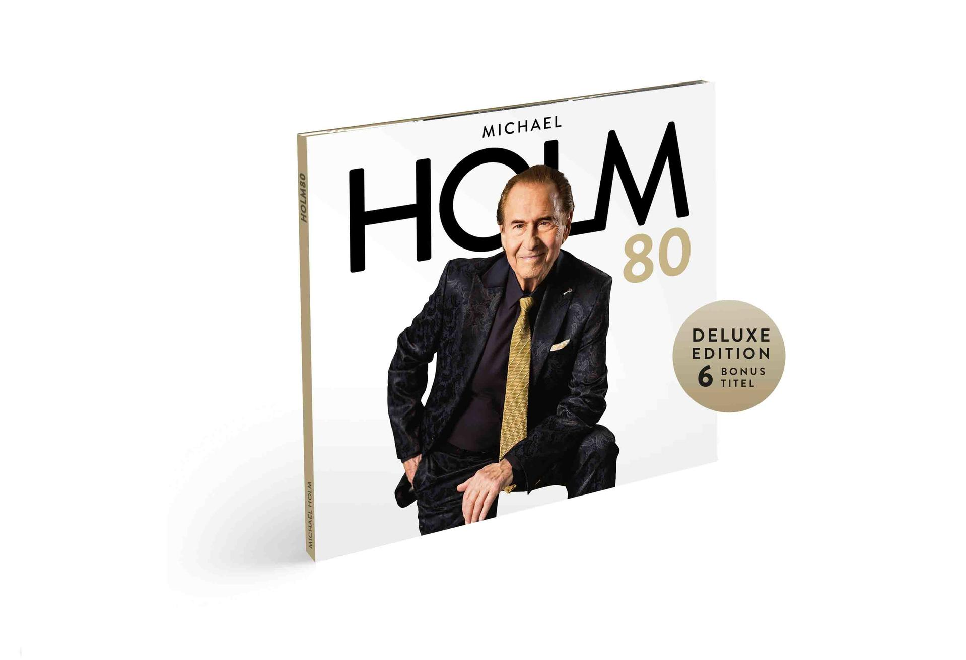 Albumcover von Michael Holm, der das Album hält. Gold- und Weiß-Farbschema.