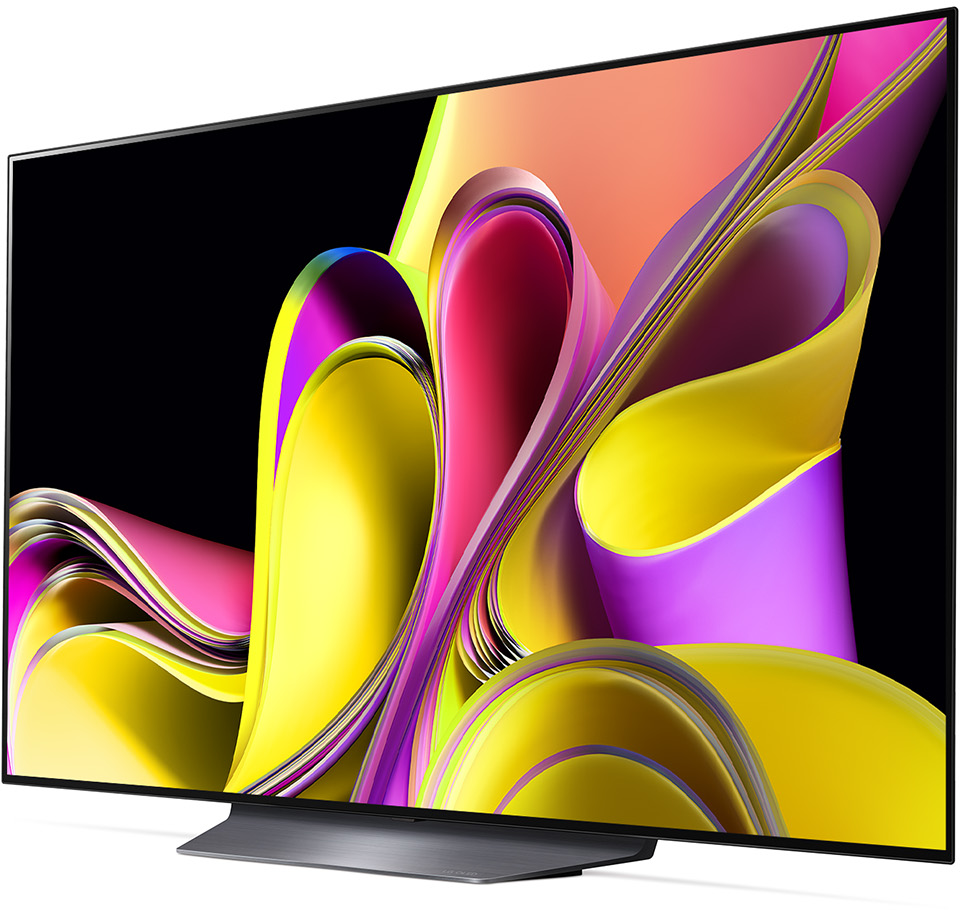 Egy nagy, modern TV ívelt képernyővel, amely absztrakt, színes művészetet jelenít meg.