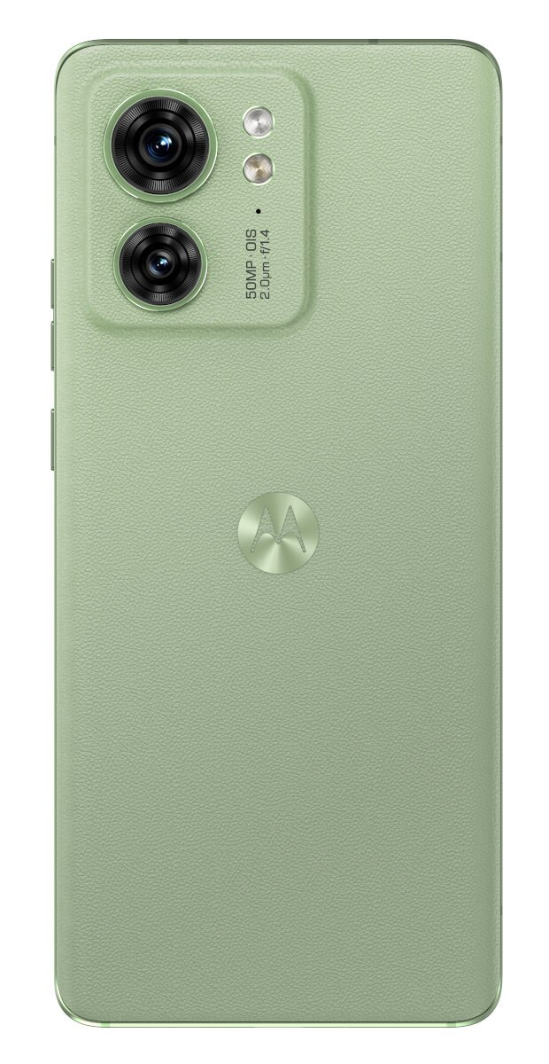 Jasnozielony tył telefonu Motorola. Dwie kamery, lampa błyskowa. Logo Motorola. Jasnozielona teksturowana powierzchnia. Białe tło.