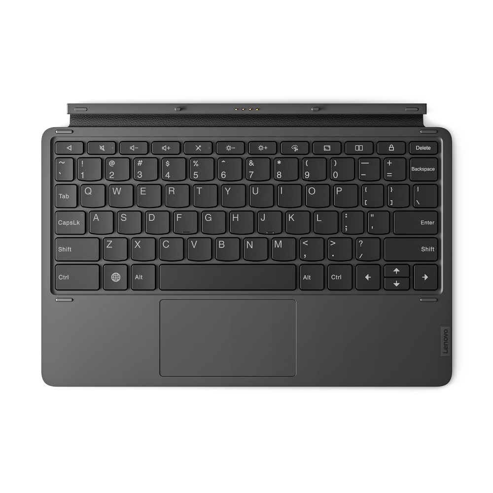 Un teclado negro con un panel táctil sobre un fondo oscuro.