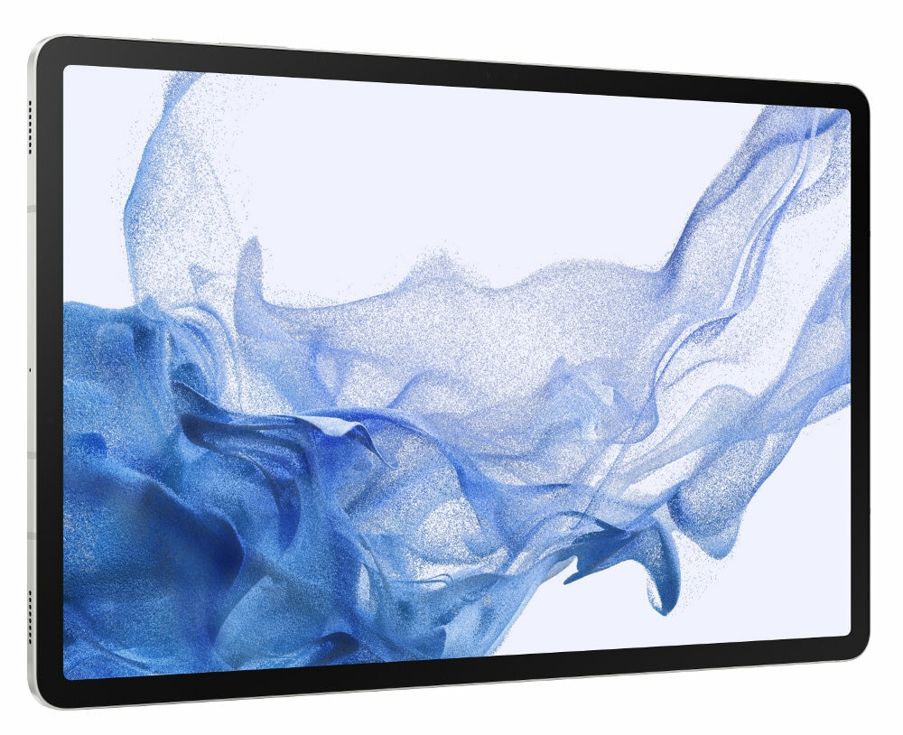 Srebrny tablet. Ekran wyświetla niebiesko-biały falisty abstrakcyjny wzór.