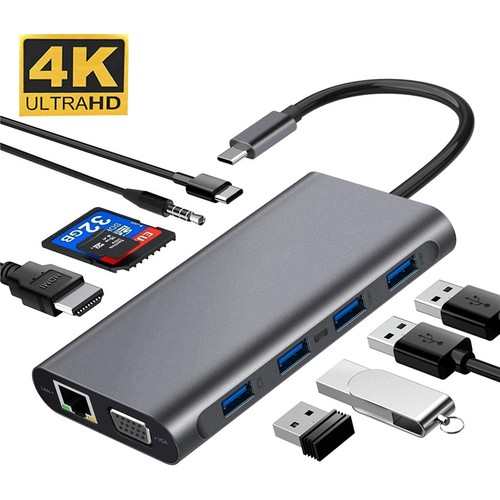 Çoklu bağlantı noktalarına ve bağlı cihazlara sahip gri bir USB hub.