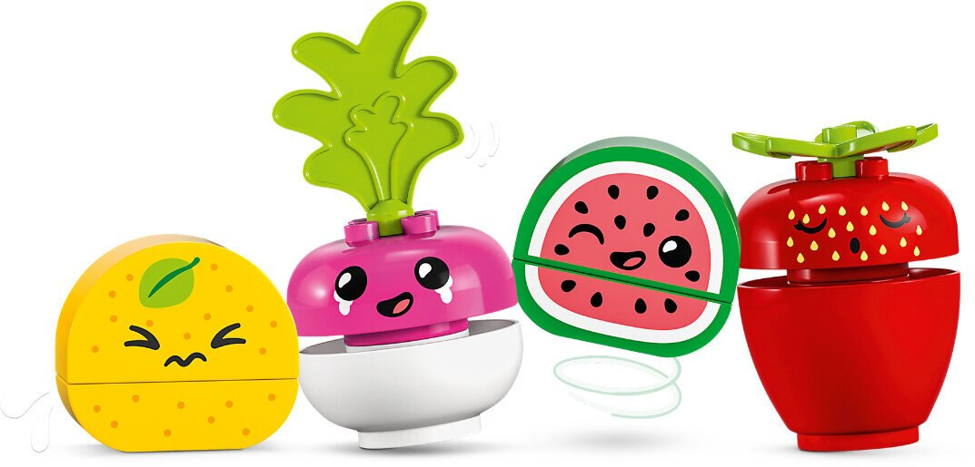 Cztery kolorowe figurki owoców Lego Duplo: cytryna, rzodkiewka, arbuz i truskawka.