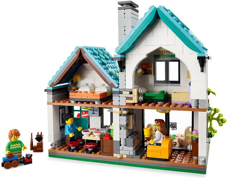 Zestaw domu Lego z dwoma piętrami, z pokojami i minifigurkami.