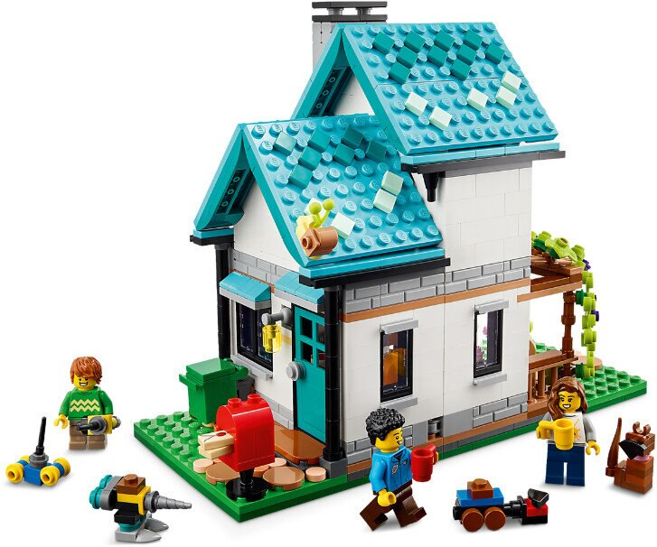 Dom Lego z ludźmi i narzędziami. Niebieski dach i zielona podstawa.