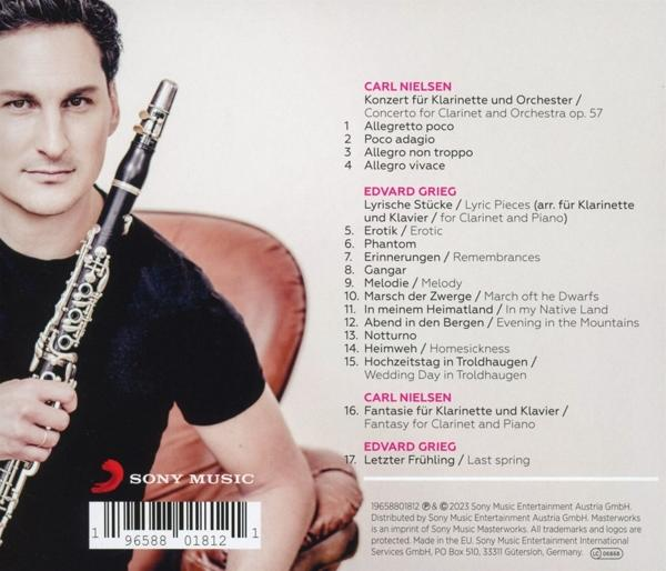 Album-Rückseite mit Text und einem Mann, der eine Klarinette hält. Sony Music-Logo sichtbar.